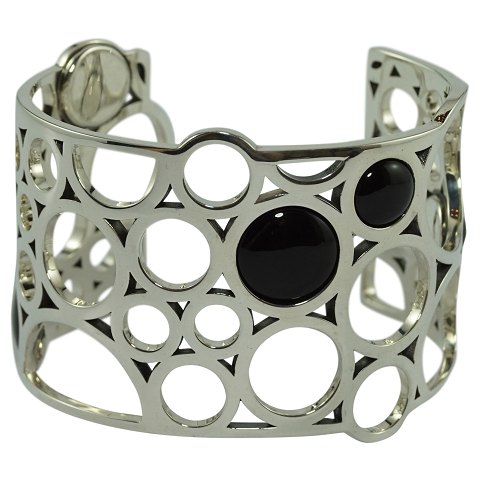 Georg Jensen, Regitze Overgaard; A Bangle of sterling silver with black agate