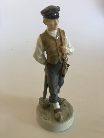 Royal Copenhagen Figurine of Farmer Boy with Hammer No. 620