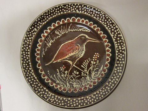 Pottery dish with bird decoration
Diam: 37cm
