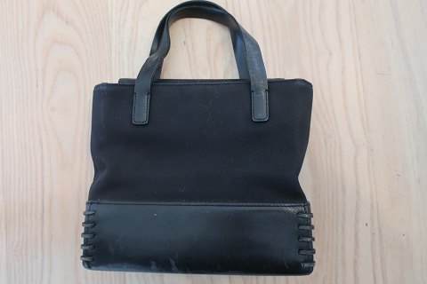 Vintage handbag with cool deco
From "DKNY"