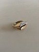Georg Jensen 18K Partly Rhodinated Gold Ring with ten Brilliant Diamonds.