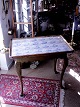 Middelfart 
Antik presents: 
Rococo 
tile table of 
painted wood