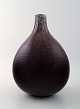Axel Salto for Royal Copenhagen: Large Stoneware vase decorated with oxblood 
glaze.