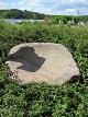Saddle quern, carved in granite, antique, 
approximately 1850
We have a large choice of good, antique, Danish 
troughs, millstones, saddle querns etc.
Please contact us for further information