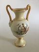 Bing & Grøndahl Early vase with overglaze decoration and Roman/Greek bisque 
heads