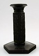 Just Andersen, candlestick of patinated bronze.
