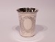Small cup decorated with chasings in hallmarked silver from the 1930s.
5000m2 showroom.