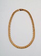 Vintage Art Deco necklace 18k gold composed of rectangular joints and adorned 
with beads along the edge.