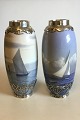 Danam Antik 
presents: 
Royal 
Copenhagen Art 
Nouveau A pair 
of vases 
decorated with 
ship motifs and 
Sterling ...