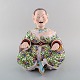 L'Art presents: 
Large, 
rare and 
antique Meissen 
pogade in 
hand-painted 
porcelain with 
mobile head, 
tongue and ...