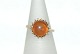 Antik Huset 
presents: 
Gold ring 
with amber 14 
Karat
Size: 52