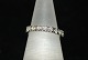 Antik Huset 
presents: 
White gold 
ring with 9 
Brillant 14 
Karat
Size 52
