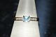 Antik Huset 
presents: 
9 Carats 
Gold Ring with 
Diamonds and 
Aquamarine 
Size 56