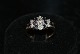 Antik Huset 
presents: 
9 Karat 
Gold ring with 
Diamonds and 
Sapphire
Size: 57