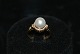 Antik Huset 
presents: 

18 Carat 
Gold ring with 
Pearl and 
Diamonds 
Size: 52