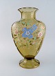 Emile Gallé, Frankrig. Stor antik vase i røgfarvet kunstglas med blomster, grene 
og kors i emalje. Museumskvalitet. 1890