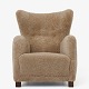 Roxy Klassik 
presents: 
Danish 
Cabinetmaker
Upholstered 
armchair in 
lambskin with 
high back and 
legs in stained 
...