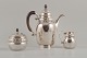 L'Art presents: 
Rare Georg 
Jensen coffee 
pot with 
matching 
creamer and 
sugar bowl in 
sterlingsilver 
and ...