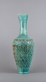 L'Art presents: 
Gudmundur 
Einarsson 
(1895-1963), 
Icelandic 
ceramist. 
Ceramic floor 
vase featuring 
geometric ...
