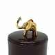 Antik 
Damgaard-
Lauritsen 
presents: 
Ole 
Lynggaard; Big 
elefant clasp 
in 14k gold, 
set with 
diamond