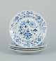 L'Art presents: 
Meissen, 
Germany. A set 
of four Blue 
Onion Pattern 
dinner plates 
in porcelain.