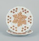 L'Art presents: 
Meissen, 
Germany. A pair 
of antique 
porcelain 
plates 
decorated with 
flowers in gold 
leaf.