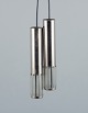 L'Art presents: 
Schmahl & 
Schulz, 
Germany. A pair 
of ceiling 
pendants in 
stainless steel 
and acrylic 
glass.