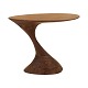 Oval walnut lamp table by Morten Stenbæk, Denmark. Signed Morten Stenbæk. H: 
48cm. Top: 64x41cm