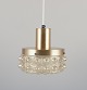 L'Art presents: 
Helena 
Tynell, Finnish 
glass artist, 
for Limburg.
Designer 
ceiling lamp in 
clear glass and 
metal.