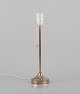 L'Art presents: 
Nybro 
Armaturfabrik, 
Sweden. Brass 
table lamp.
Sleek 
Scandinavian 
design with 
wooden toggle 
...