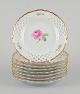 L'Art presents: 
Meissen, 
Germany.
A set of eight 
"Pink Rose" 
reticulated 
plates.