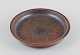 L'Art presents: 
Saxbo, 
Denmark.
Ceramic bowl 
with brown 
glaze.