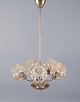 L'Art presents: 
Helena 
Tynell.
Five-armed 
ceiling lamp in 
brass.