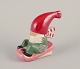 L'Art presents: 
Lisa 
Larson for 
Gustavsberg.
Candlestick 
holder. Elf on 
sled.