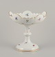 L'Art presents: 
Meissen, 
Germany. Large 
porcelain 
centerpiece.
Hand-painted 
with polychrome 
floral motifs.