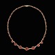 Bestik.dk 
presents: 
Hermann 
Siersbøl. 8k 
Gold Necklace 
with Garnets.