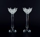 L'Art presents: 
Swarovski, 
Austria. A pair 
of candle 
holders in 
faceted 
crystal.