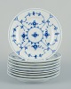 L'Art presents: 
Royal 
Copenhagen Blue 
Fluted Plain, 
nine dessert 
plates in 
hand-painted 
porcelain.