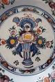 Antique Delft plate(s)
3 rare alike handmade
Polycrom decorated
Decorated with a vase with flowers decorated at 
the rim too
With signatur
1600-years- 1700-years
Diam: 23cm
In a good condition,but with a little small 
cracks at the rim - We can send