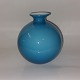 Reutemann Antik 
presents: 
Round blue 
Carnaby glass 
vase from 
Holmegaard