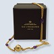 Antik 
Damgaard-
Lauritsen 
presents: 
Ole 
Lynggaard; Gold 
necklace with 
amethysts