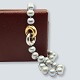 Ole Lynggaard; Fidelity clasp set with a pearl necklace of tahiti pearls