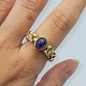 Antik 
Damgaard-
Lauritsen 
presents: 
A ring in 
18k gold set 
with sapphire 
and diamonds