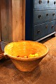 Decorative, large old handmade French clay dish "Tian