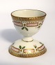 Lundin Antique 
presents: 
Royal 
Copenhagen. 
Flora Danica. 
Egg cup. Model 
3530. Diameter 
6 cm. (1 
quality).