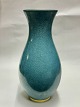 Reutemann Antik 
presents: 
Royal 
Cooenhagen: 
Blue craquele 
porcelain vase