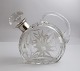 Lundin Antique 
presents: 
Crystal 
decanter with 
silver mounting 
(830). Height 
16 cm. Produced 
1938.