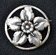 Pegasus – Kunst 
- Antik - 
Design 
presents: 
Brooch 
with flower in 
sterling 
silver, 
Heinrich 
Nicolaus Peder 
...