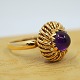 Antik 
Damgaard-
Lauritsen 
presents: 
Ring of 
14k gold set 
with Amethyst