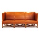 Aabenraa 
Antikvitetshandel 
presents: 
Kaare 
Klint three 
seater sofa 
with patinated 
natural 
leather. Very 
nice ...